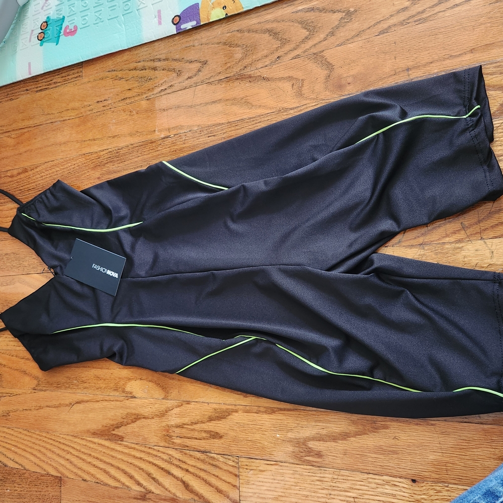 Black Jumpsuit with Green Accents